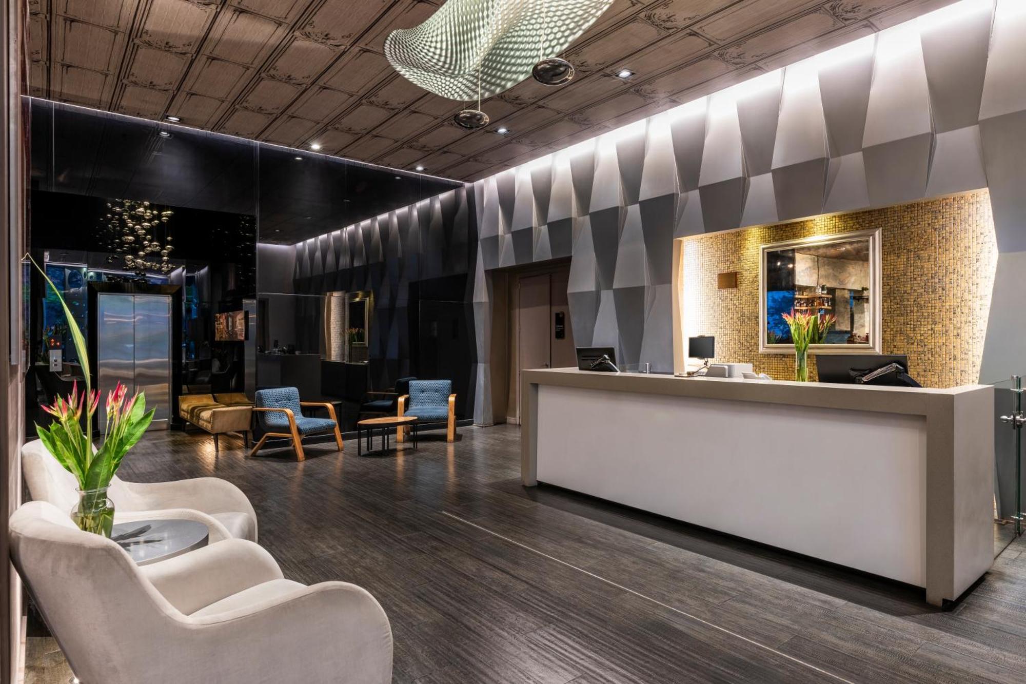 Hotel 100 Luxury Suites By Preferred ボゴタ エクステリア 写真 The lobby of the hotel