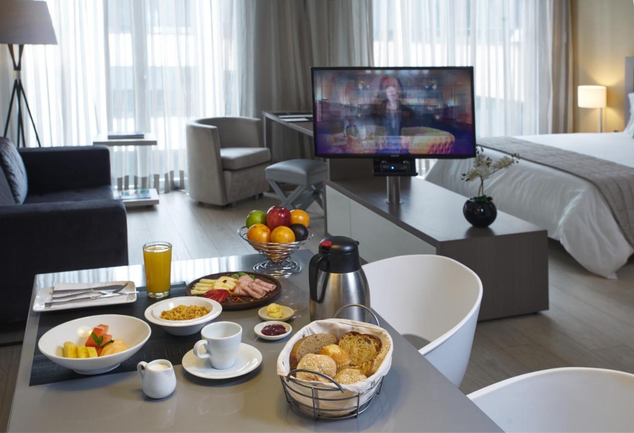 Hotel 100 Luxury Suites By Preferred ボゴタ エクステリア 写真 A room at the hotel
